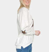 Star animal print sweater