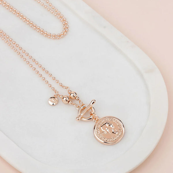 Limited Edition - Rose
Gold T-Bar Coin
Necklace